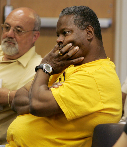 Accused of throwing brick at political rival