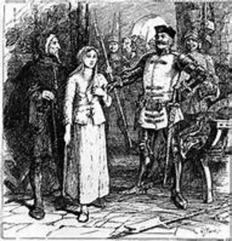 Joan tries to arrange to meet with the King.