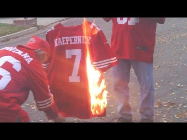Colins jersey being burned