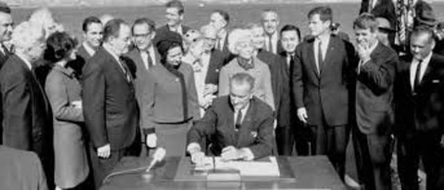 Lyndon B Johnson Signs Immigration Act