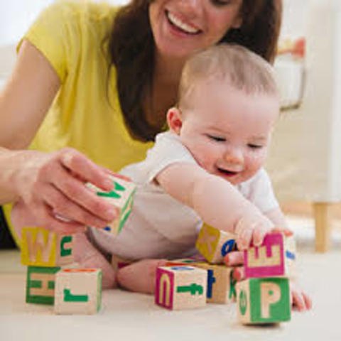 Reaches and grabs things successfully