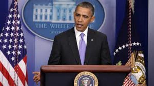 2014 - President Barack Obama signs the 1.1-trillion dollar bipartisan budget bill on January 17.