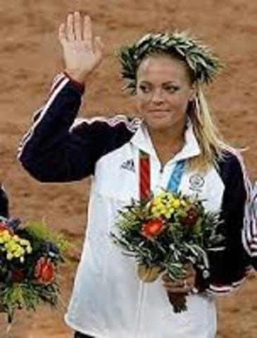 She wins the Olympics in Athens.