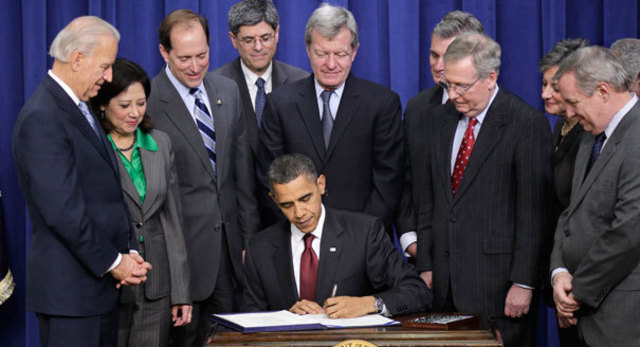 Obama Signs Tax Cut Bill