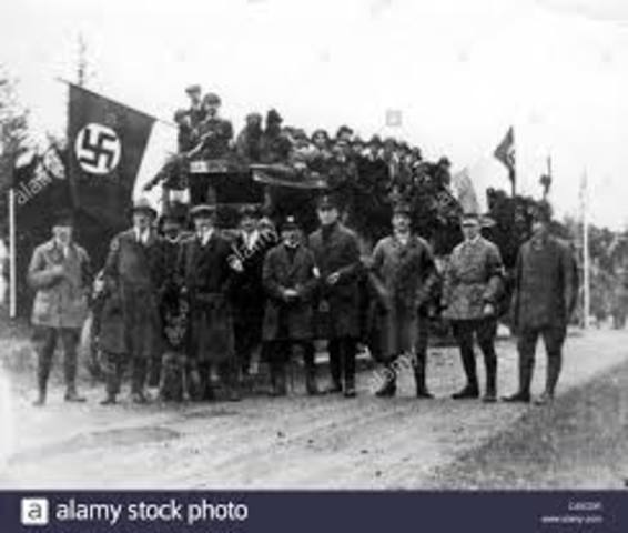 Adolf Hitler becomes the leader of the Nazi Party.