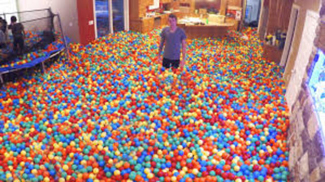 on January 20, 2015 Roman Atwood filled his house with plastic balls 2.5 ft high, turning into a massive ball pit.