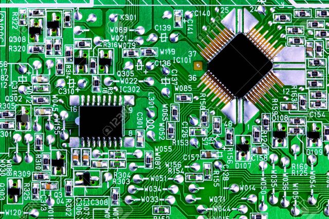 Jack Kilby makes a computer chip