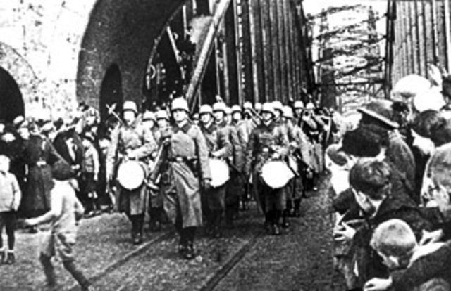1936 Hitler sends troops into Rhineland of Germany in violation of the Versailles Treaty