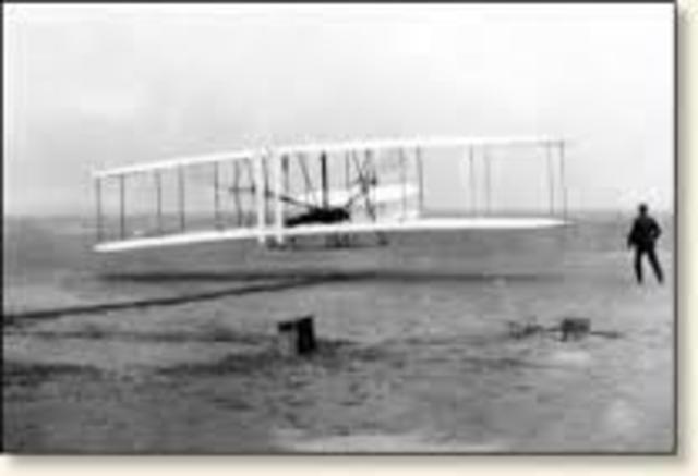 first gas motored and manned airplane