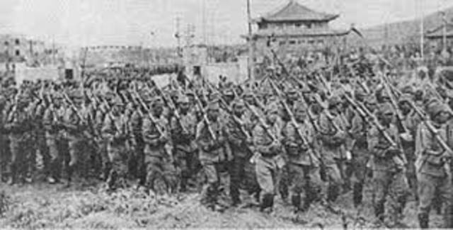 Japans army pillages Nanjing, massacre a quarter ofa million people