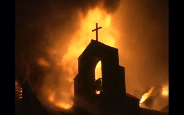 The church burns down
