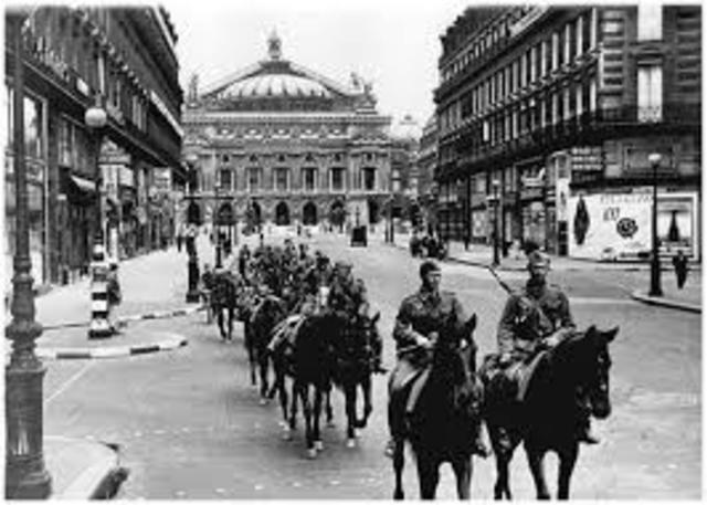 Germany invades France and forces it to surrender