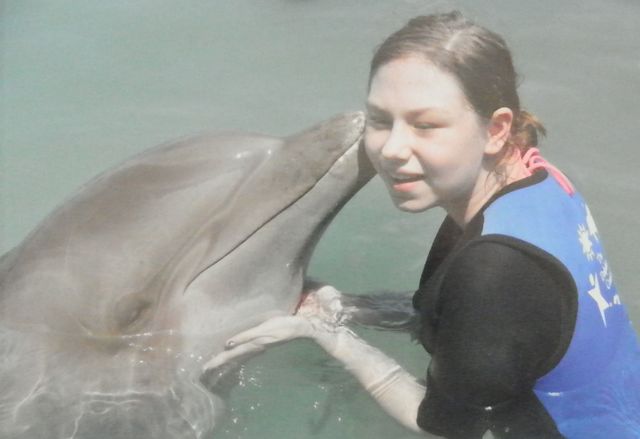 Megan swims with dolphins!