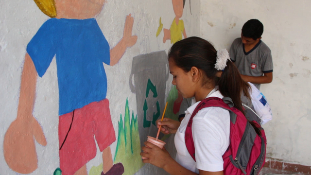 Pintata de mural escuela San Cayetano