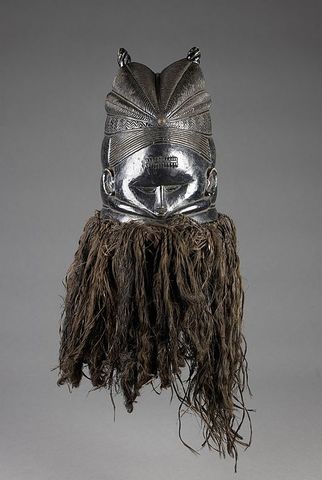 Bundu mask. Sande Society, Mende peoples (West African forests of Sierra Leone and Liberia). 19th to 20th century C.E. Wood, cloth, and fiber.