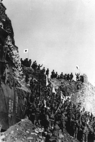 Japan's army pillages Nanjing, China; massacre of a quarter of a million people