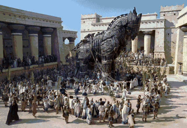 The Trojans bring the horse into the city