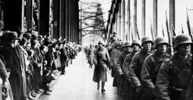1936 Hitler sends troops into Rhineland of Germany in violation of the Versailles Treaty