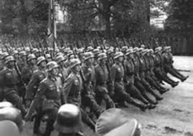 1936 Hitler sends troops into Rhineland of Germany in violation of the Versailles Treaty