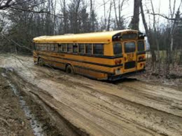 Logan Kids Dig Hole for the School Bus to Fall Into