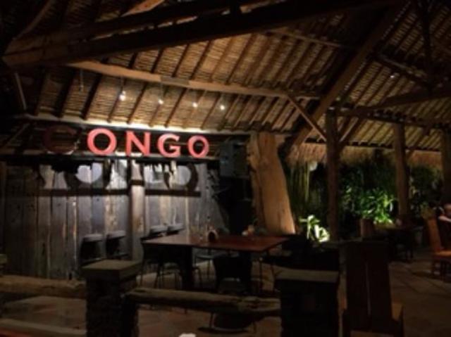 John and Jenny Meet with a contact at an organization called CARE International