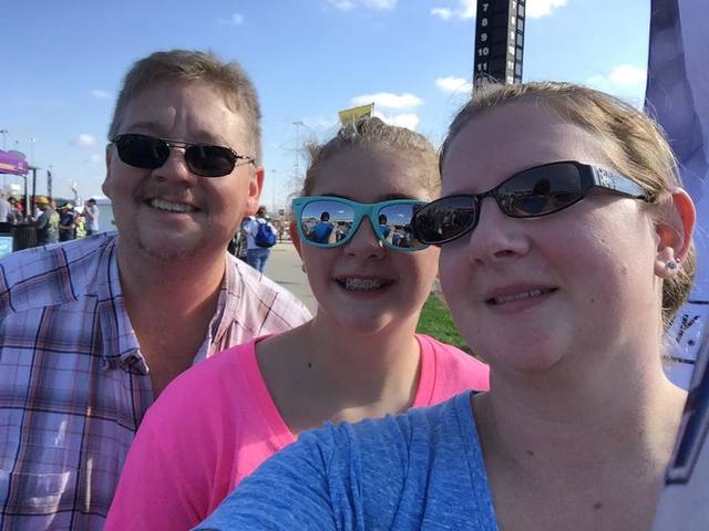 I went to a Nascar Race. "Such a fake smile mom."