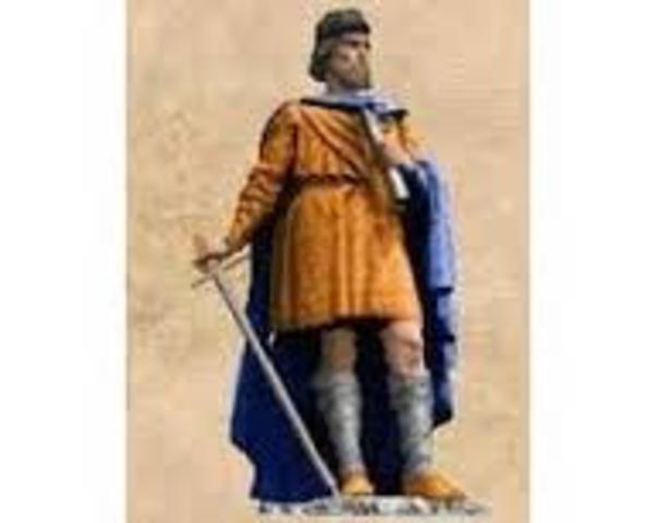 Alfred divides England with the Danes under the Danelaw pact.