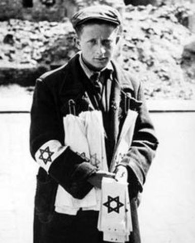 Polish Jews are ordered to wear Star of David armbands