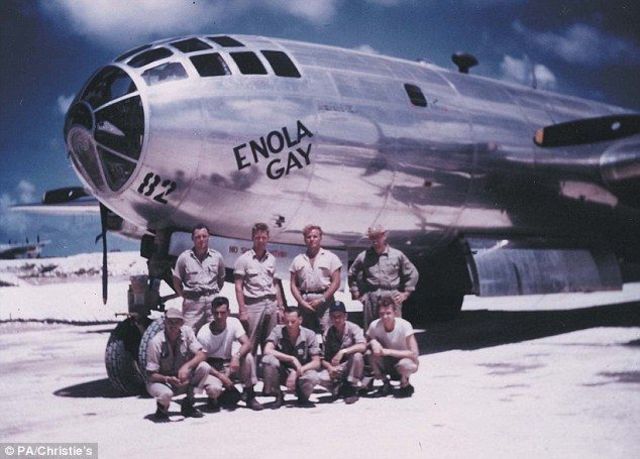 The B-29 bomber Enola Gay drops the first atomic bomb "Little Boy" on Hiroshima