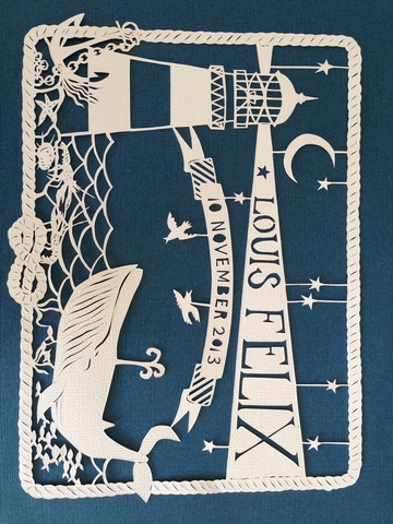 Paper cut birth announcement