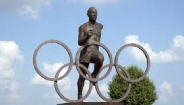 Jesse Owens wins four Gold Medals at Olympics in Germany