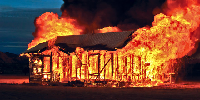 Guy Montag Burns a House Down