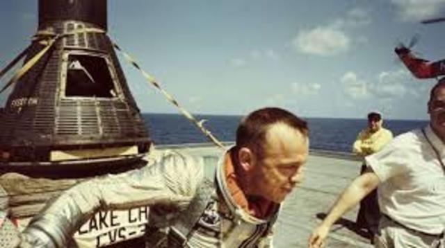 Alan Shepard makes a suborbital flight.