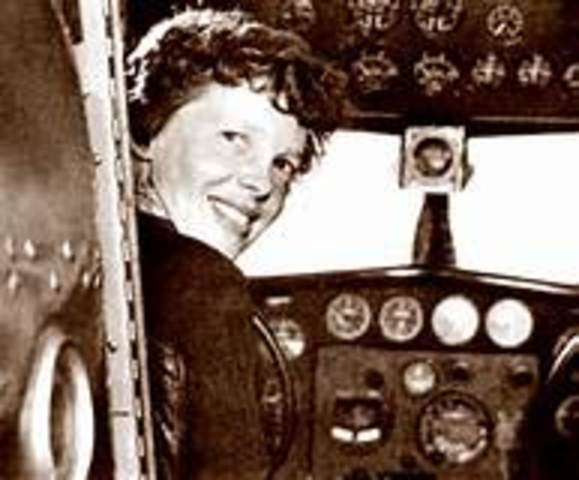 Amelia Earhart completes first solo nonstop transatlantic flight by a woman