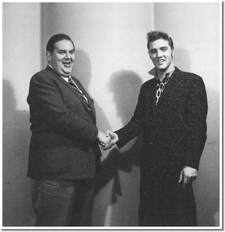 Elvis signs his first contract