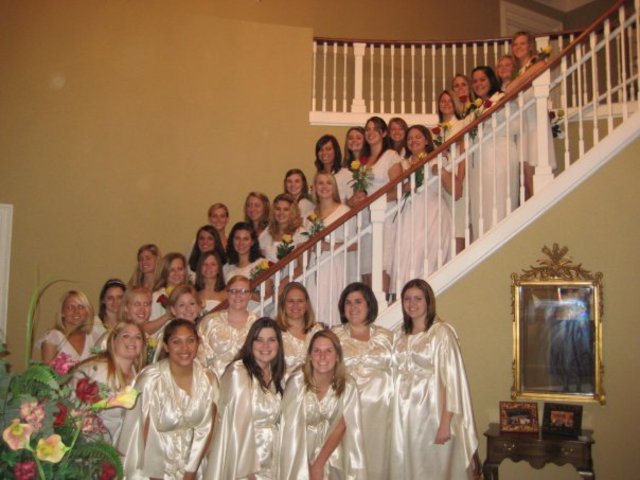 Kellie initiates Alpha Gamma Delta