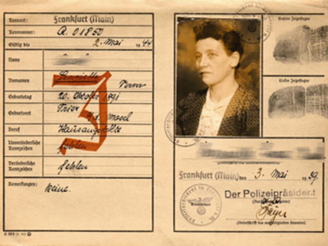 A law is established wherein all Jewish passports are required to be stamped with a large red “J”.