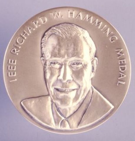 Received the IEEE Richard W. Hamming Medal from the Institute of Electrical and Electronics Engineers with Dennis Ritchie