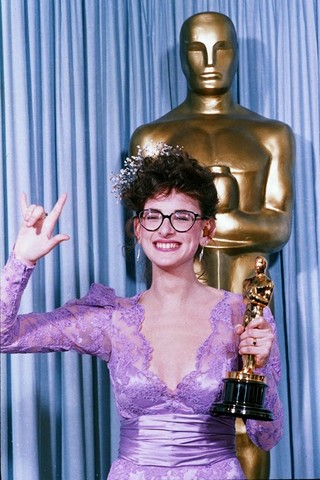 (N. Romaniw) Marlee Matlin won Best Actress at the 59th Academy Awards