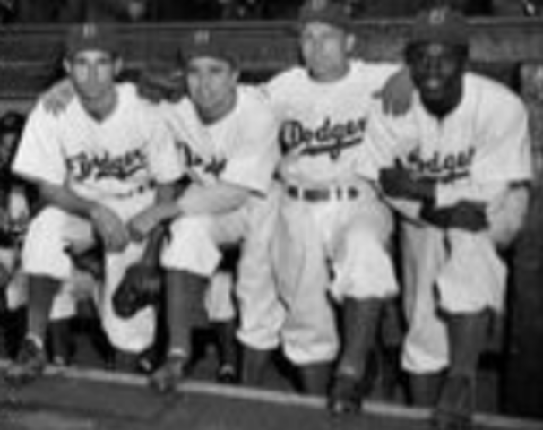 Jackie Robinson hired to the Brooklyn Dodgers