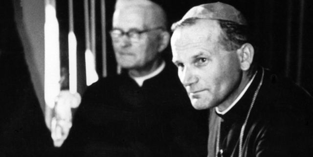 Moves to Krakow with father; enters Jagellonian University, joins experimental theater group.