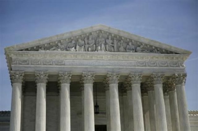 Supreme Court rules the Grandfather Clause unconstitutional