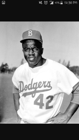Jackie Robinson signs into MLB