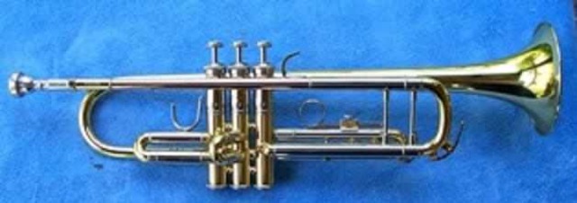 Began playing trumpet