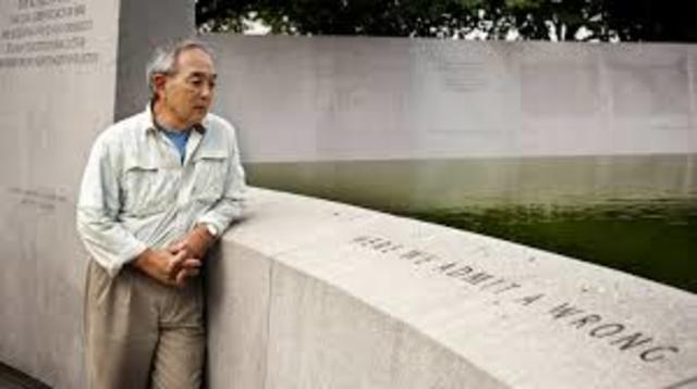 President George Bush signs into law an entitlement program to pay each surviving Japanese American internee $20,000.