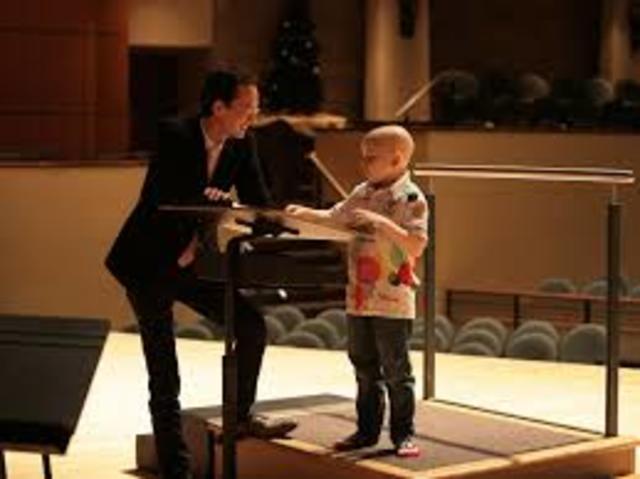 On stage with orchestra at Rudder Auditorium