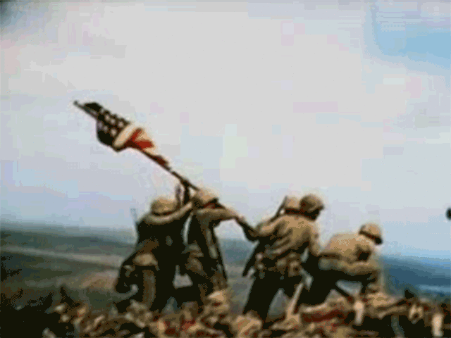 United States Marines land on Iwo Jima.