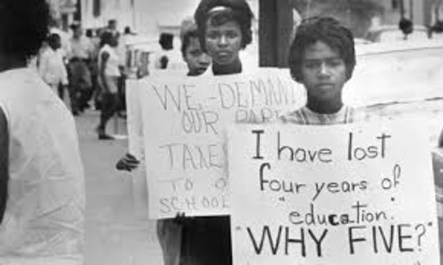 Southern Congressmen resist desegregation with Southern Manifesto