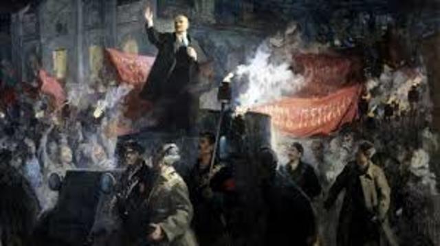 Lenin returns from exile and arrives in Petrograd via a sealed train