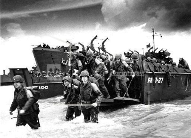 American and other Allied troops landed in Normandy, France, on D-Day to begin the liberation of Western Europe.